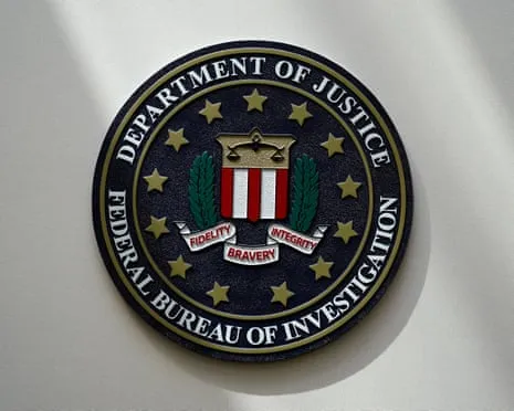 Suspect Wanted Following Car Crashed into Federal Bureau of Investigation Entrance in Potential Incident of Terror